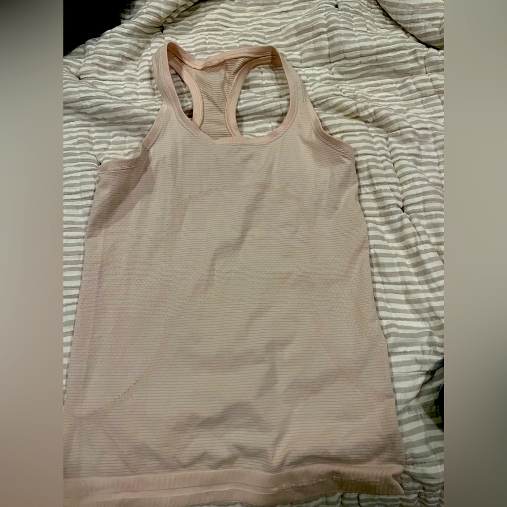 Lululemon size 4 swiftly tech racerback tank top.